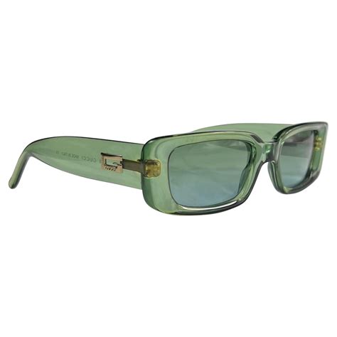 gucci big logo sunglasses|gucci sunglasses clear.